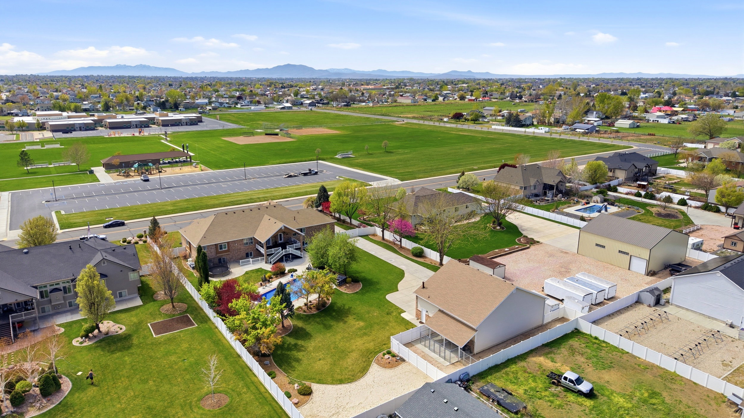 Aerial view of residential area featuring mountains