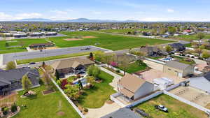 Aerial view of residential area featuring mountains