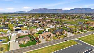 Aerial view of residential area featuring a mountain backdrop