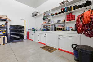 Garage featuring a workshop area