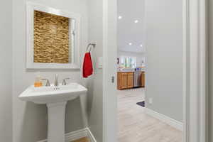 Bathroom with baseboards and recessed lighting