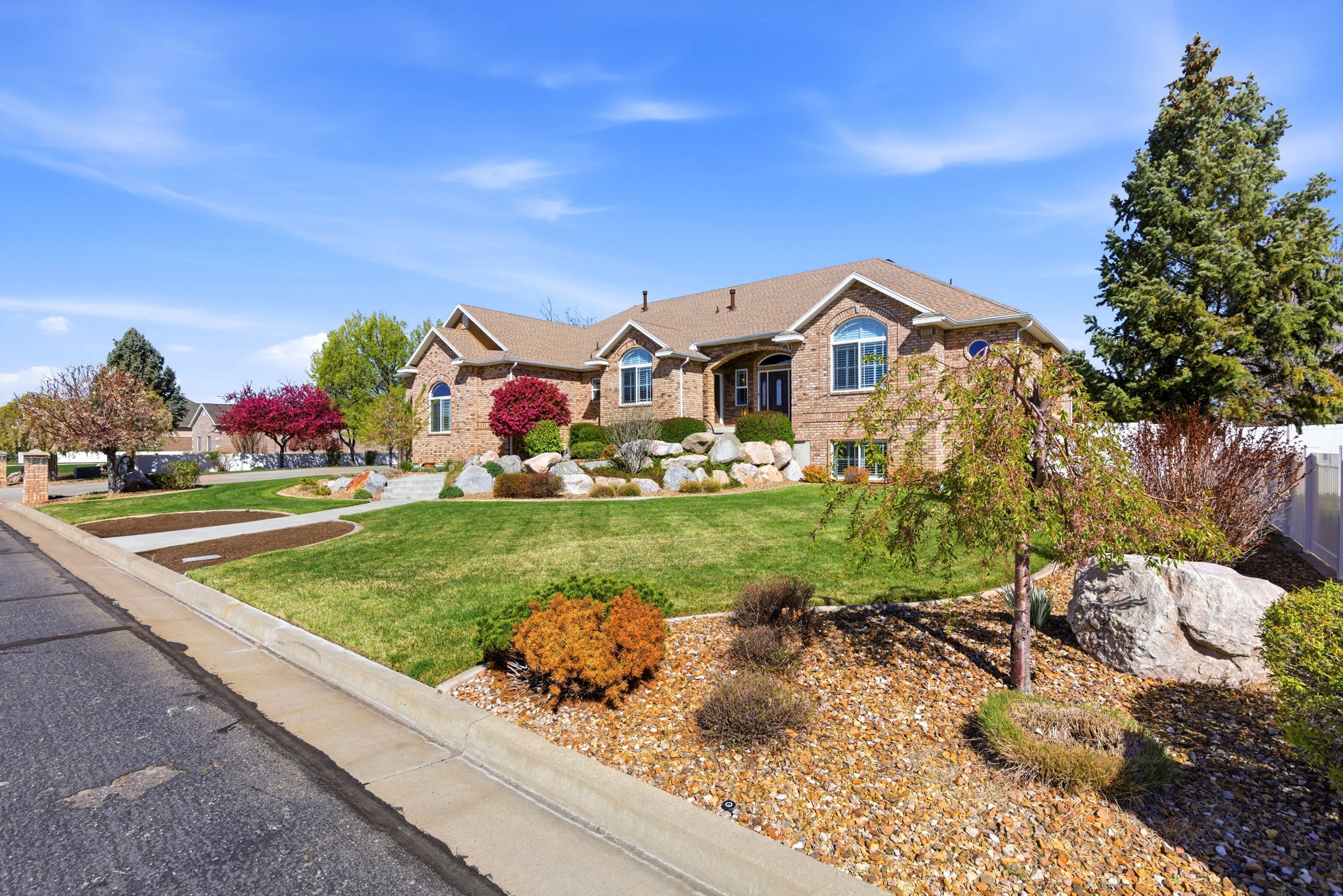 Ranch-style home with brick siding
