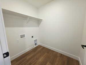 Laundry room featuring dark wood finished floors, hookup for an electric dryer, and washer hookup