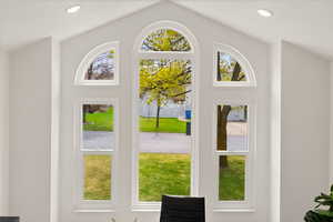 Doorway featuring recessed lighting