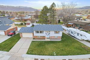 Aerial view of residential area with a mountainous background