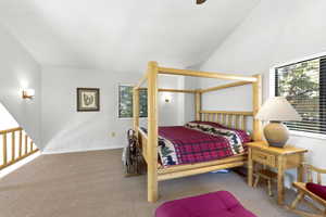 Bedroom with light carpet and ceiling fan