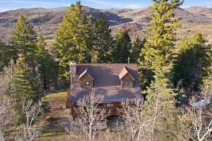 View from above of property featuring a mountain backdrop