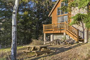 Wooden terrace featuring stairs