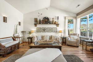 Living area with wood-type flooring