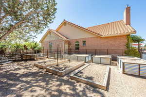 View of patio / terrace featuring a vegetable garden