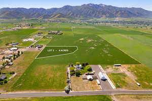 View of property location with mountains, property boundaries highlighted, and rural landscape