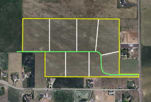 Aerial map of property and surrounding area featuring property parcel outlined