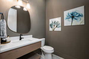 Bathroom featuring vanity and toilet