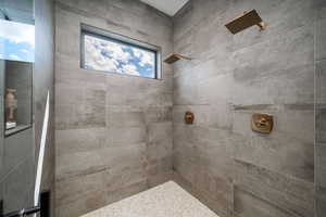 Bathroom with a tile shower