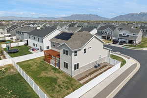 Corner lot, fully fenced, RV pad, with paid off solar! Convenient location to community pool, gym, and clubhouse