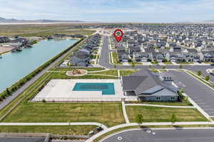 Corner lot, fully fenced, RV pad, with paid off solar! Convenient location to community pool, gym, and clubhouse