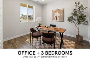 Office space with dark wood-style floors and recessed lighting