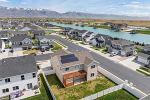 Corner lot, fully fenced, RV pad, with paid off solar! Convenient location to community pool, gym, and clubhouse