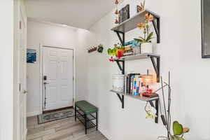 Stairs to the right of front entry