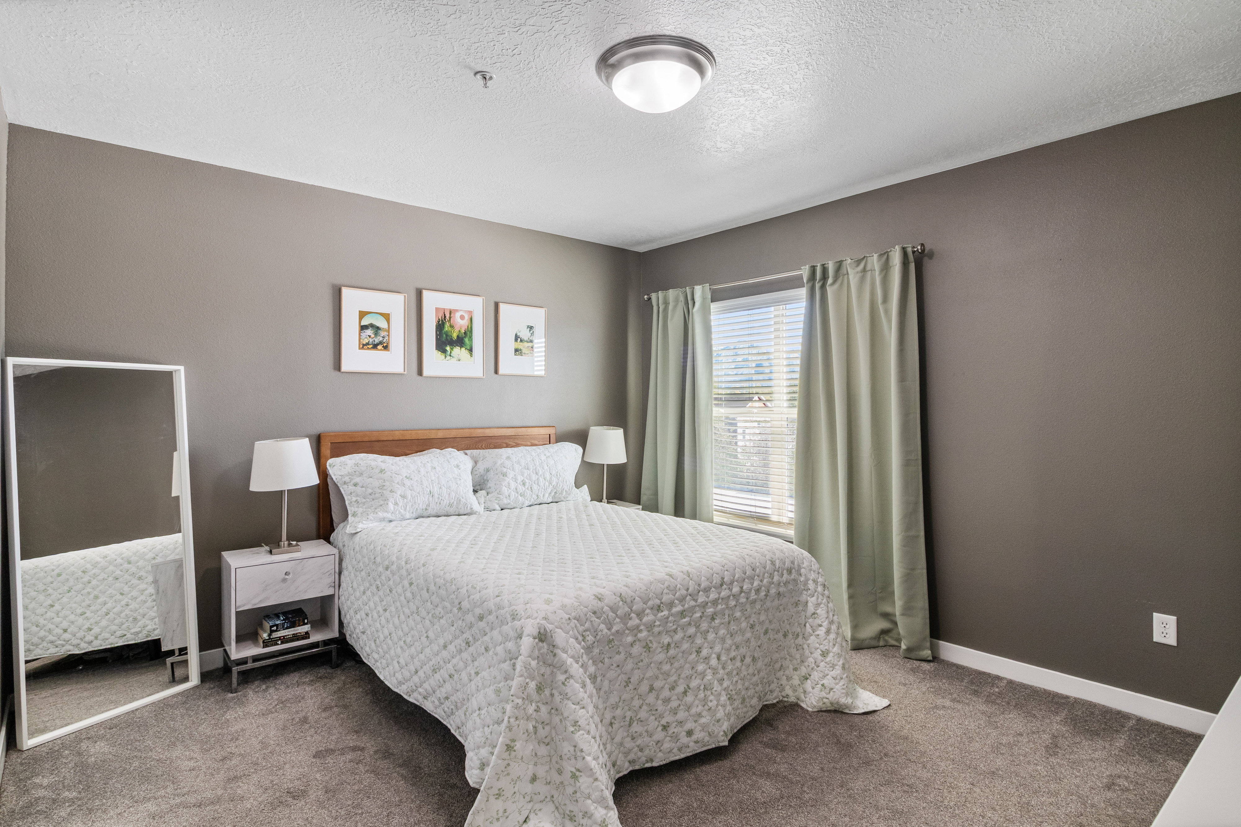 Primary bedroom with shared bathroom.