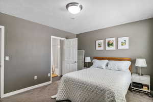 Primary bedroom with shared bathroom