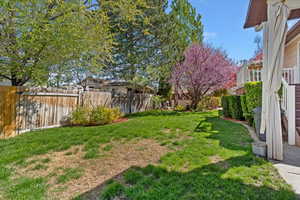 View of fenced backyard