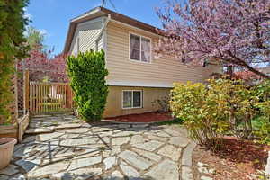 Back of property with a patio