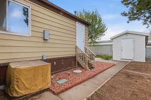 View of patio / terrace with a storage shed