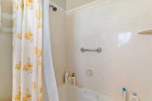 Bathroom featuring shower / bath combo