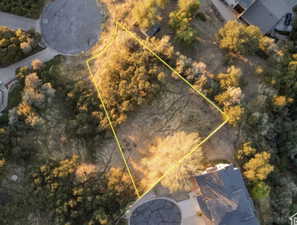 Aerial view of property and surrounding area with property parcel outlined