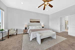 Bedroom with light carpet, crown molding, a ceiling fan, and recessed lighting