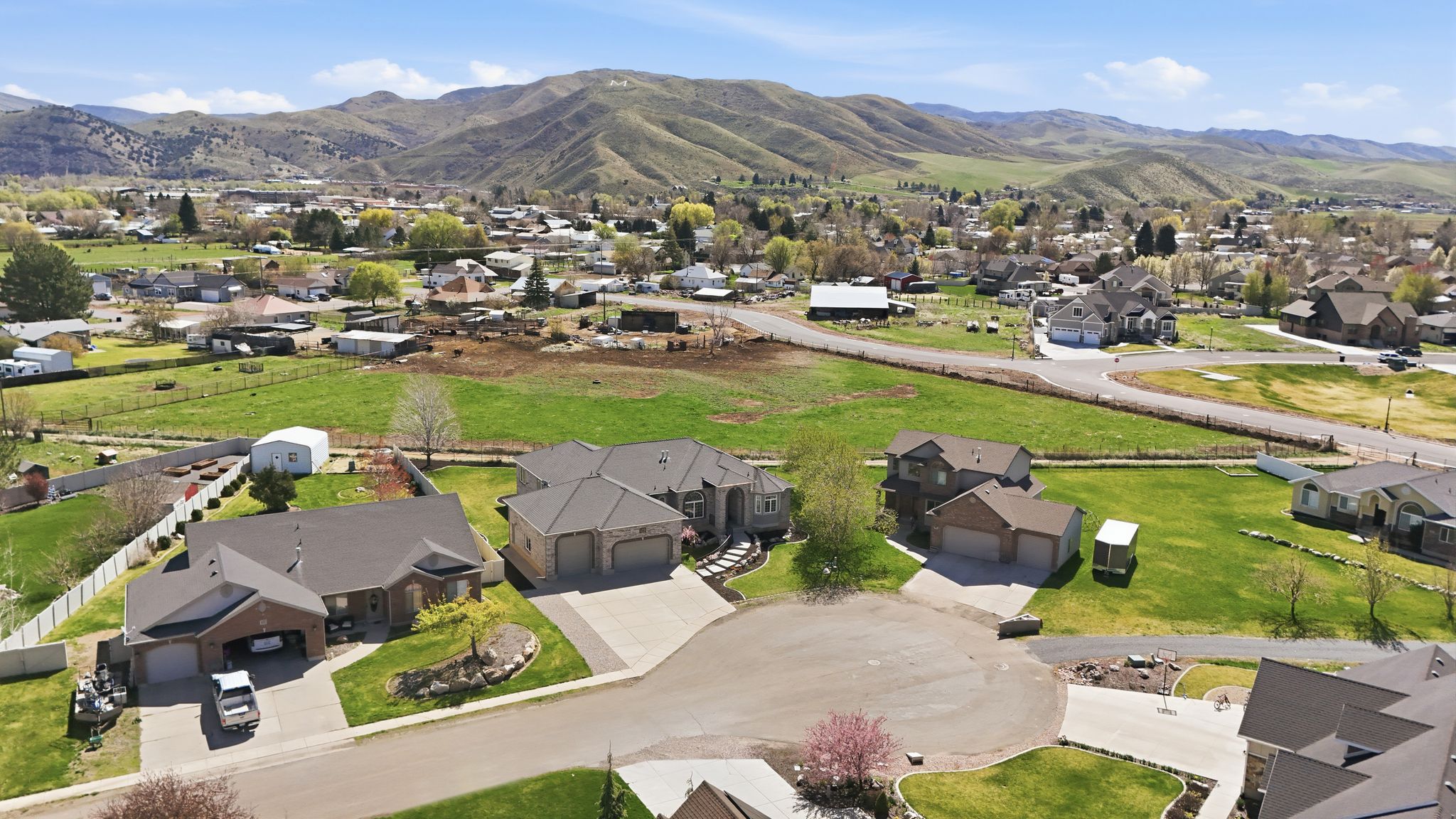 Aerial view of residential area with mountains