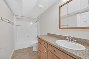 Full bath featuring vanity and shower / bathtub combination