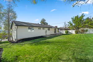 Back of house with brick siding