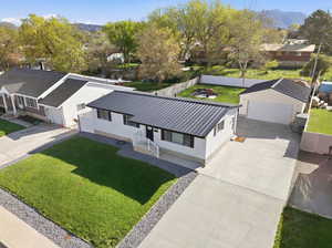 Aerial view of residential area featuring mountains