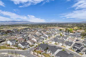 Aerial view of residential area with a mountainous background