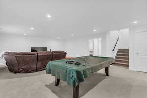 Rec room featuring recessed lighting, light carpet, and pool table