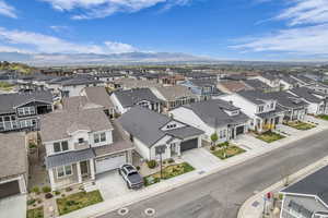 Aerial view of residential area featuring mountains