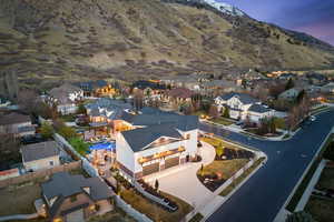 Aerial view at dusk of a residential view and a mountain view