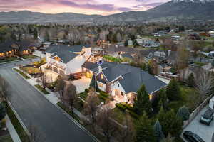 Aerial perspective of suburban area with a mountainous background