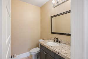 Bathroom featuring vanity and light tile patterned floors