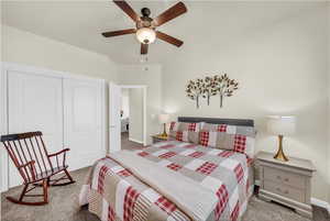Bedroom featuring carpet, a closet, and ceiling fan