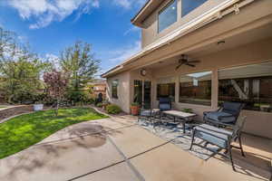 View of patio featuring ceiling fan
