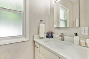 Bathroom featuring vanity