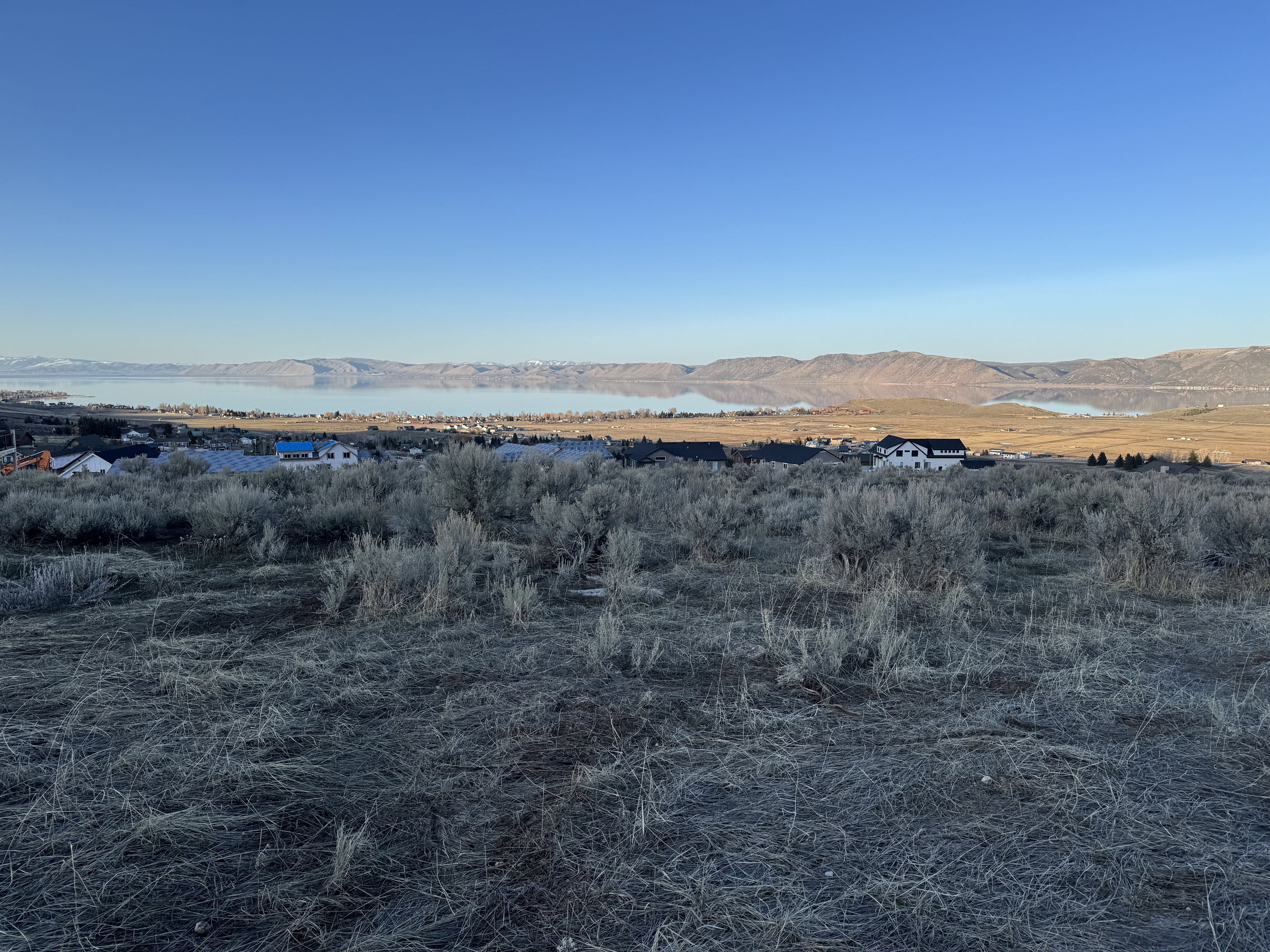 Mountain view featuring a nearby body of water