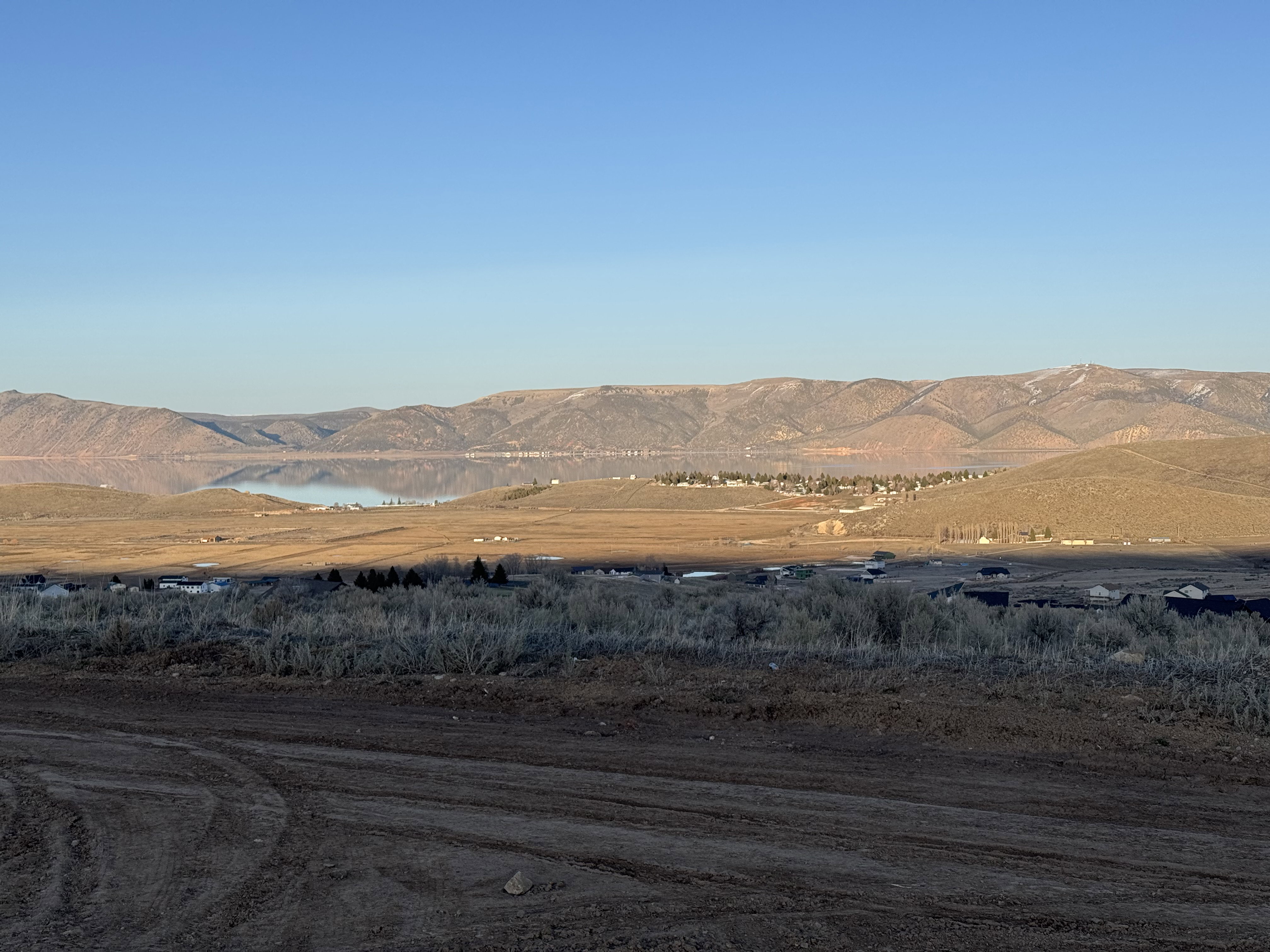 View of mountain backdrop with a large body of water