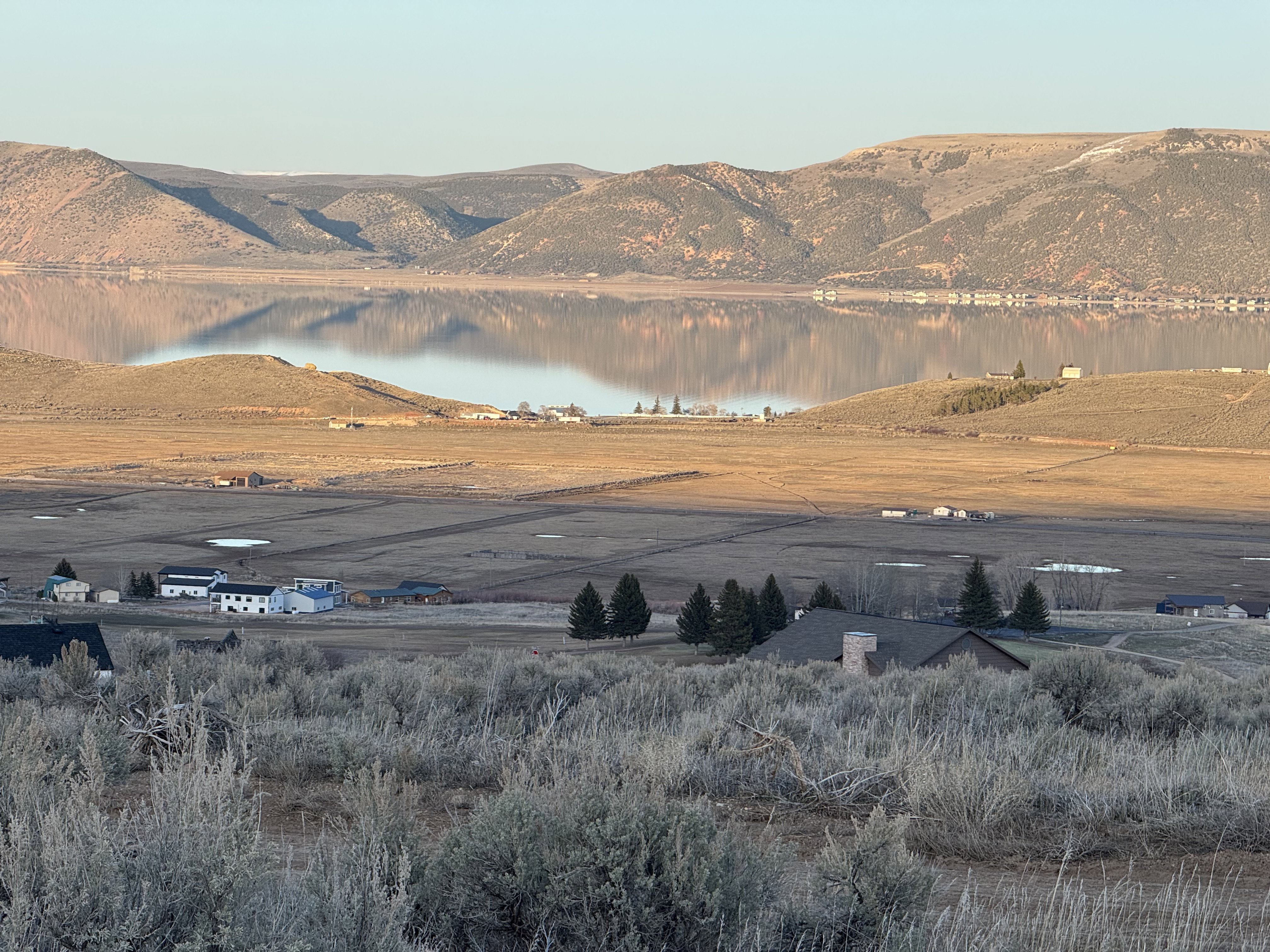 View of mountain background with a nearby body of water