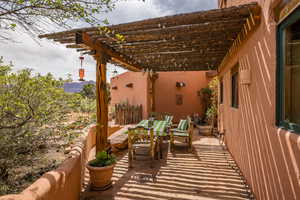 View of patio / terrace with a pergola and outdoor dining space