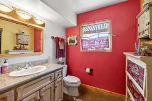 Half bath with toilet and vanity