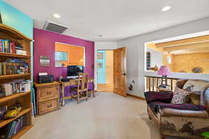 Office featuring light carpet and recessed lighting